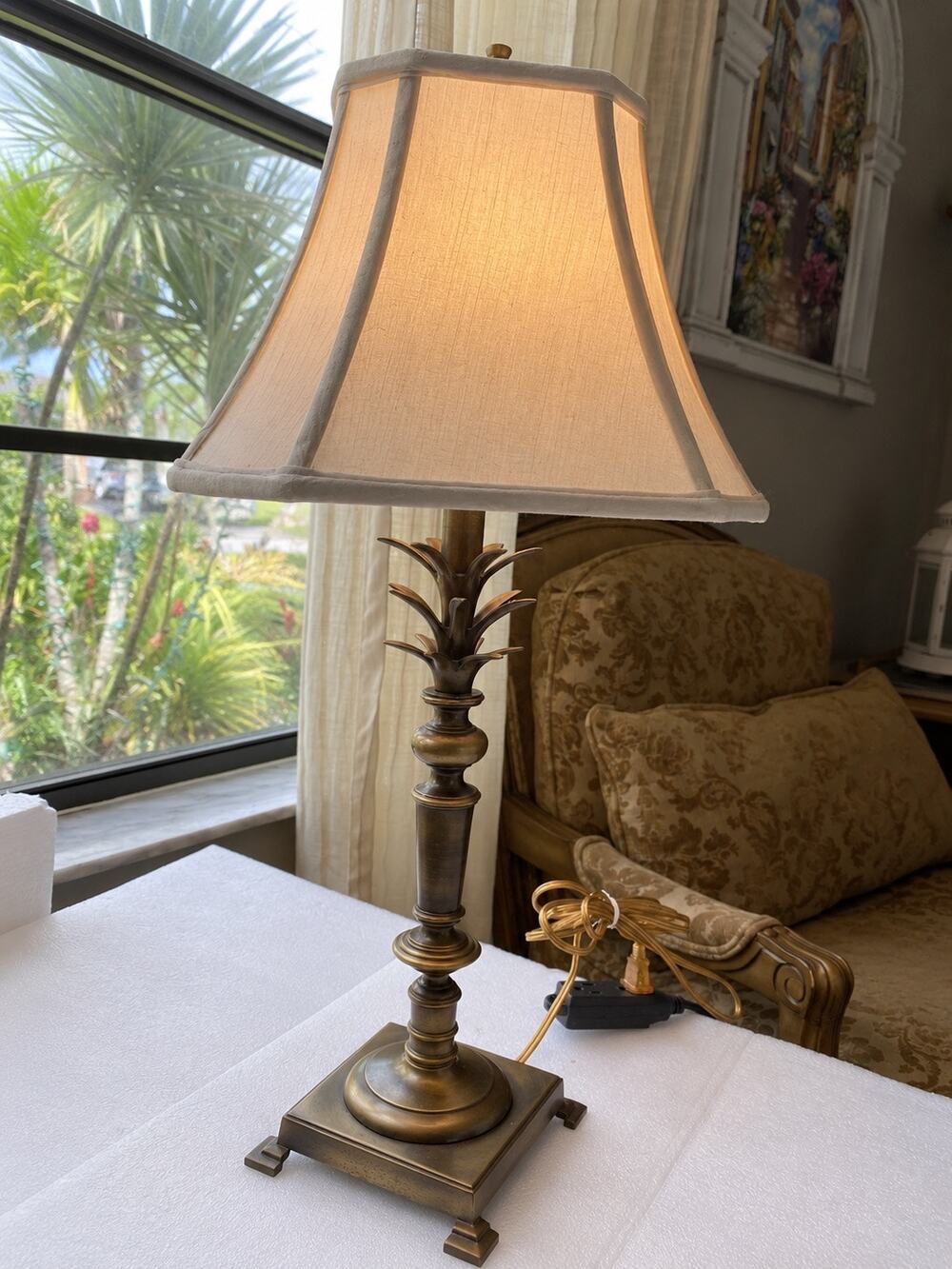 vintage brass palm tree table lamp featuring a detailed square base fabric shade